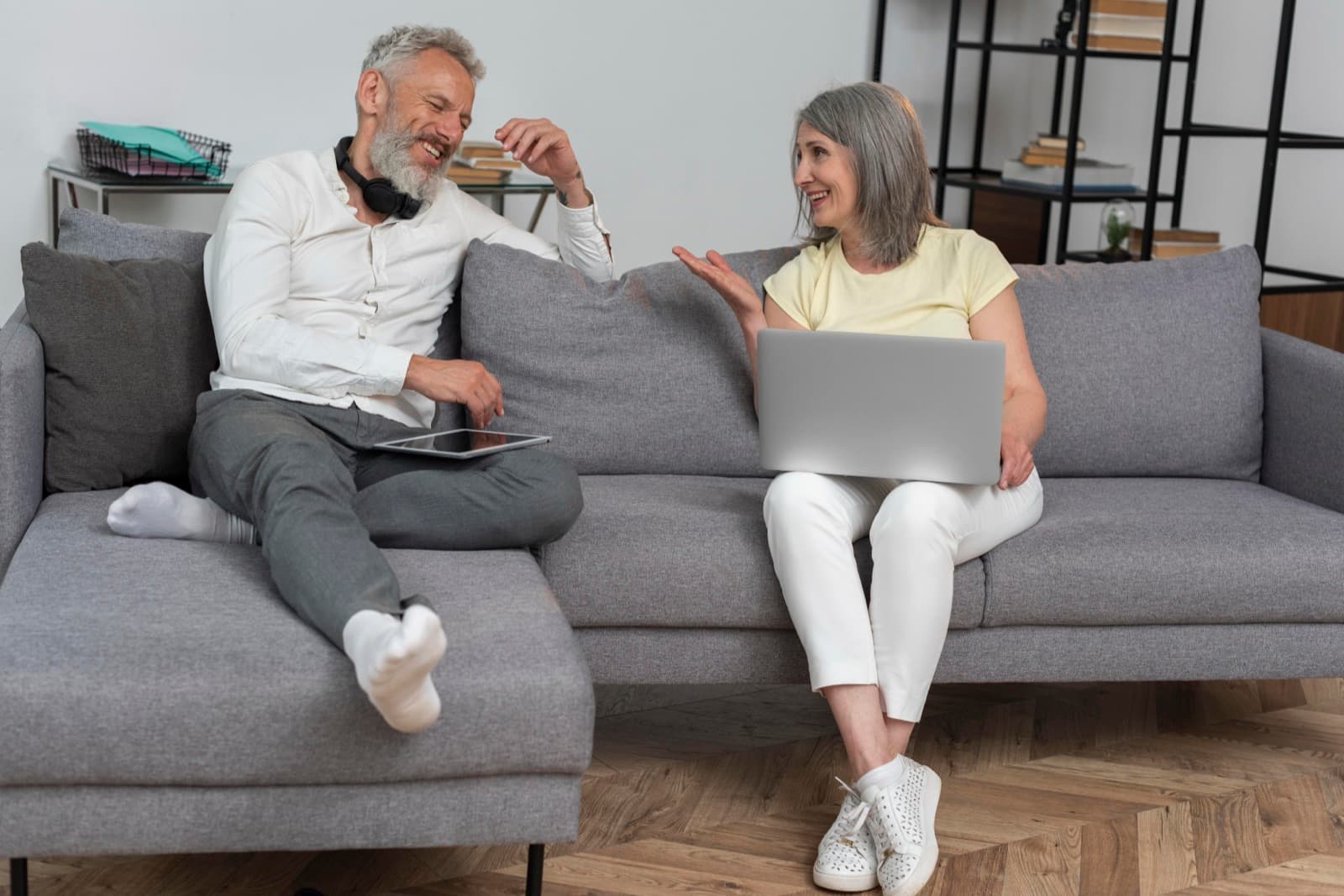 A retired couple relaxing together at home