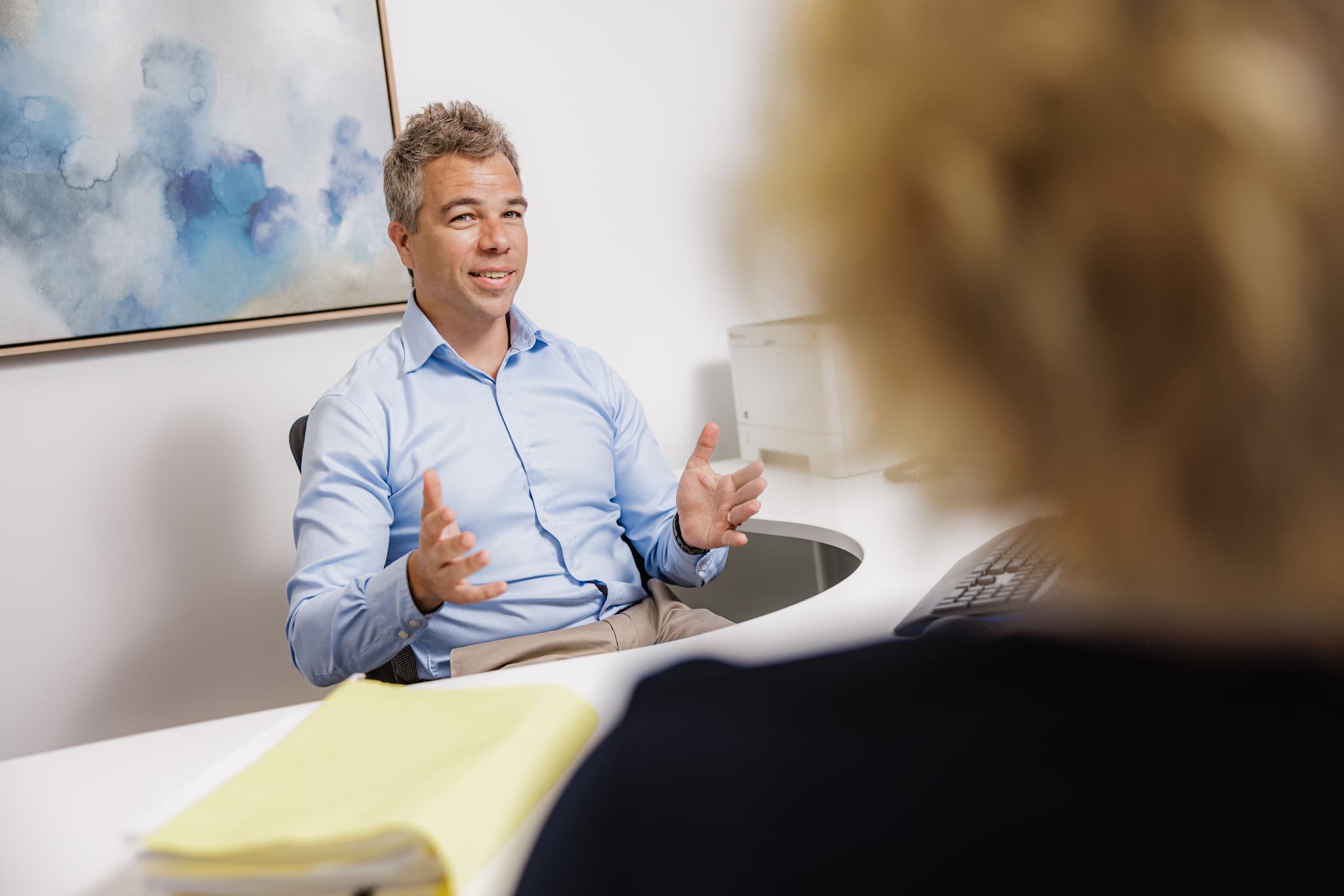 Business owner reviewing a clear monthly reporting dashboard