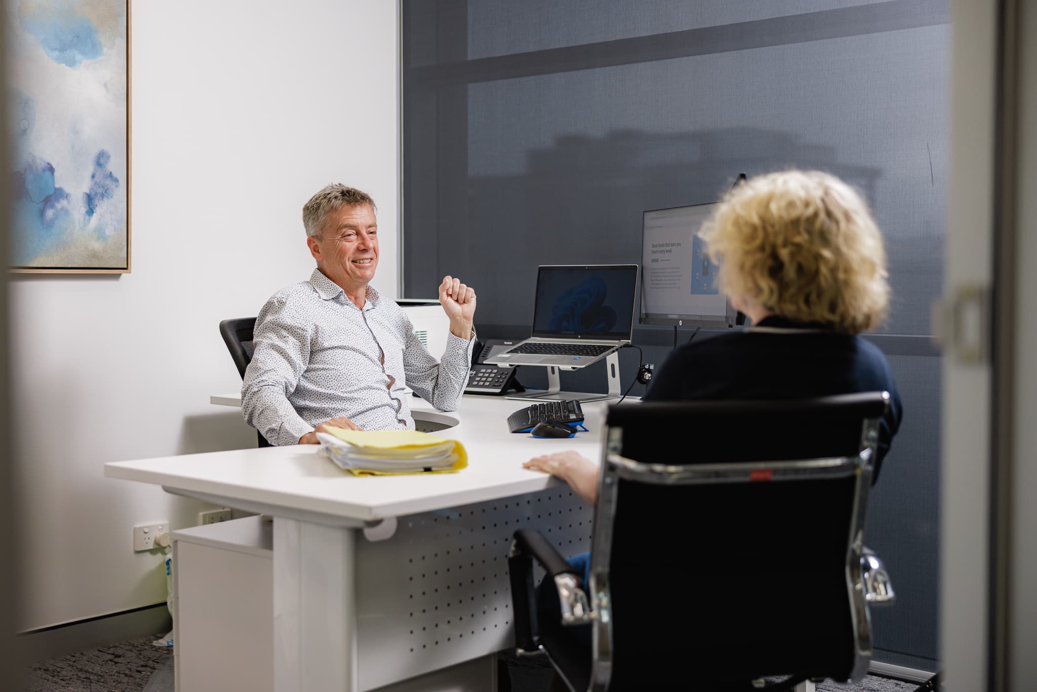 EEA Advisory adviser reviewing property investment strategy with Brisbane clients