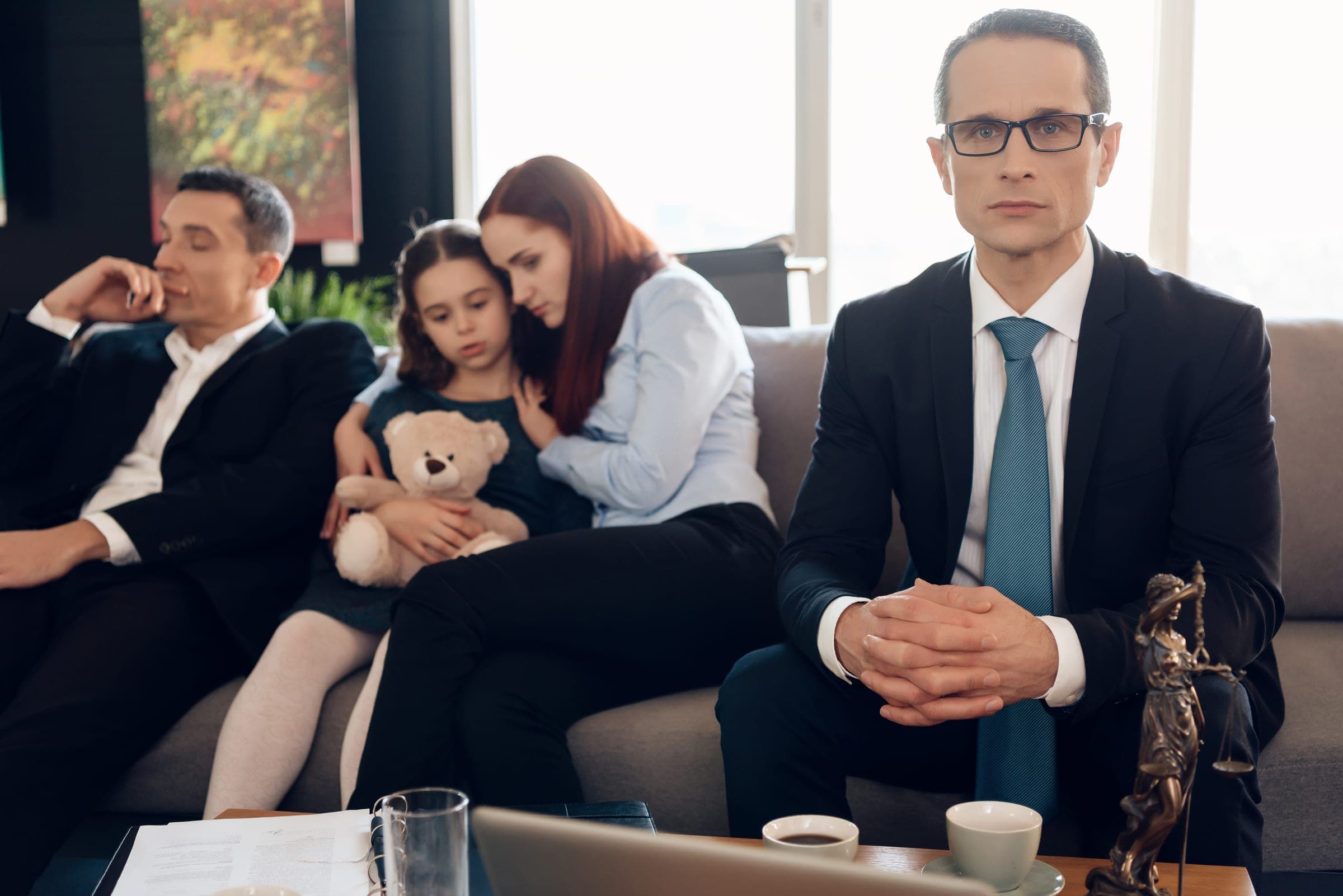 Family meeting after director's death, discussing business future.