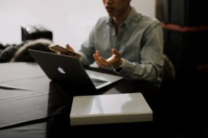 Director reviewing company finances to comply with Division 7A and Fringe Benefits Tax rules in Australia, 2025.