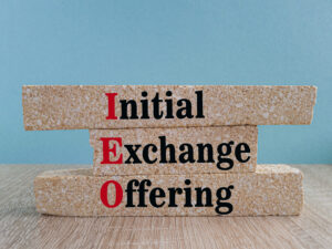 Wooden blocks with Initial Exchange Offering text for CGT blog post feature